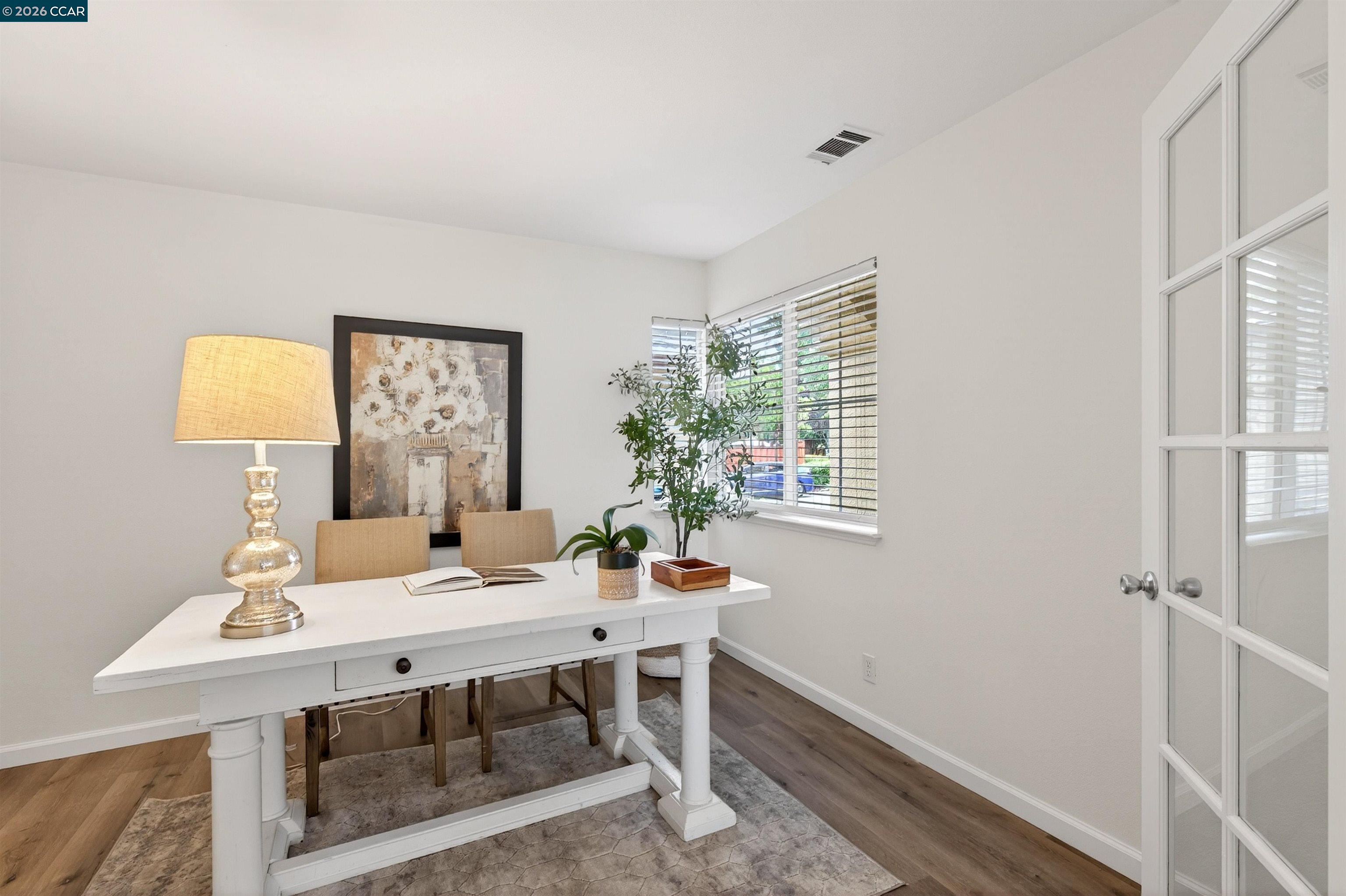 124 Coralflower Lane San Ramon, CA 94582 - Photo 23 of 47 a view of a dining room with a table and chairs
