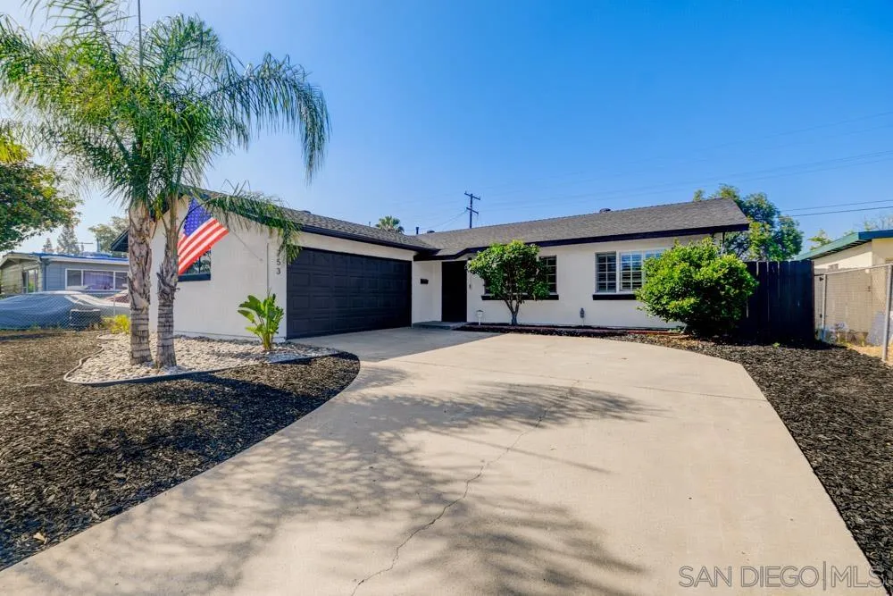 753 Farview Street El Cajon, CA 92021 - Photo 1 of 26 a front view of a house with a yard and a garage
