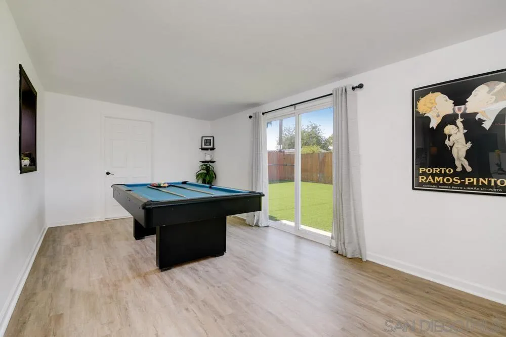 753 Farview Street El Cajon, CA 92021 - Photo 11 of 26 a living room with wooden floor and furniture
