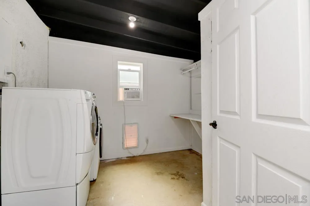 753 Farview Street El Cajon, CA 92021 - Photo 14 of 26 a view of storage and utility room with a refrigerator