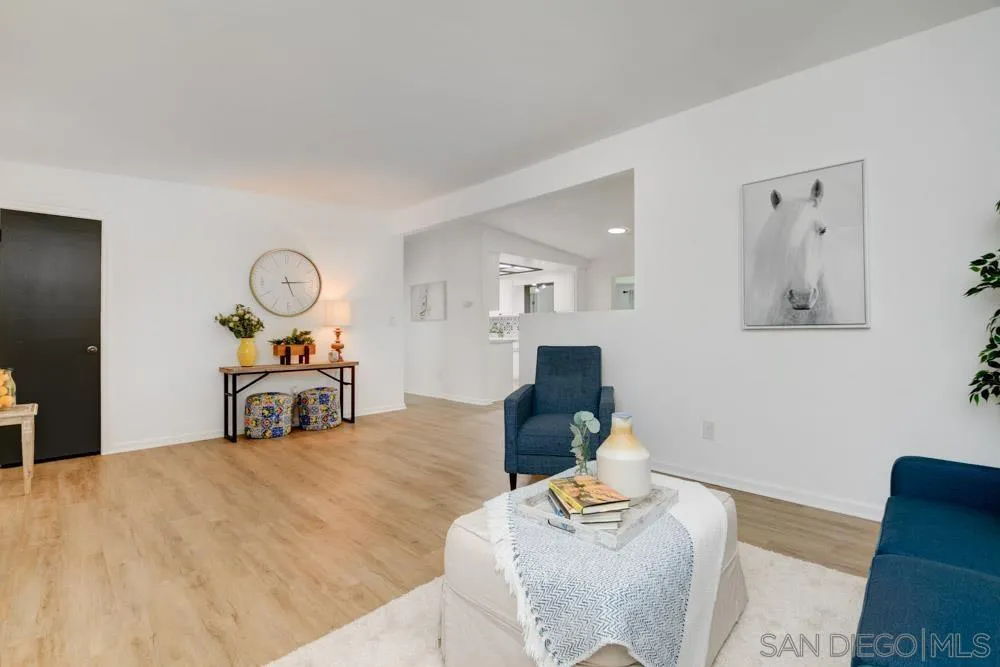 753 Farview Street El Cajon, CA 92021 - Photo 4 of 26 a bedroom with furniture and a wooden floor