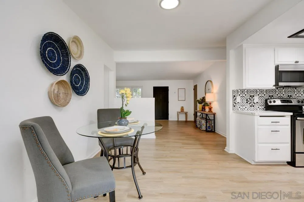 753 Farview Street El Cajon, CA 92021 - Photo 6 of 26 a view of a dining area with furniture and a clock