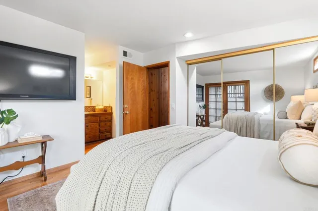 an aerial view of residential building with parking