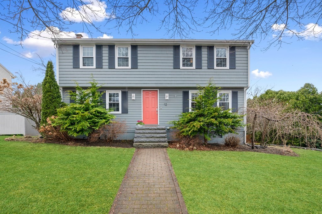 12 Pitman Road Marblehead, MA 01945 - Photo 1 of 28 a front view of a house with a garden