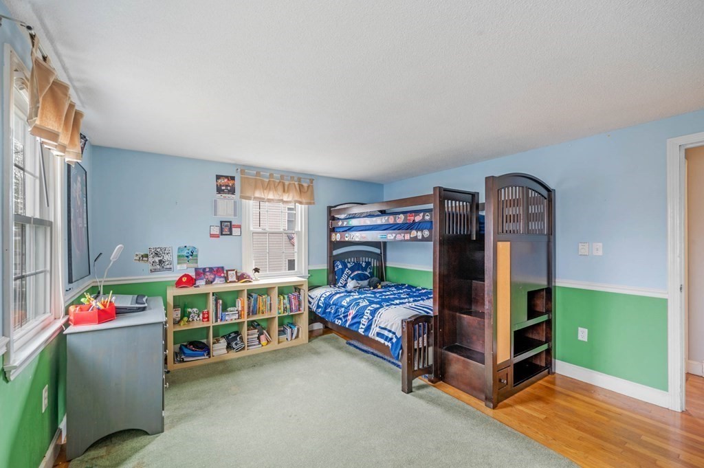 12 Pitman Road Marblehead, MA 01945 - Photo 17 of 28 a bedroom with bunk bed and a window
