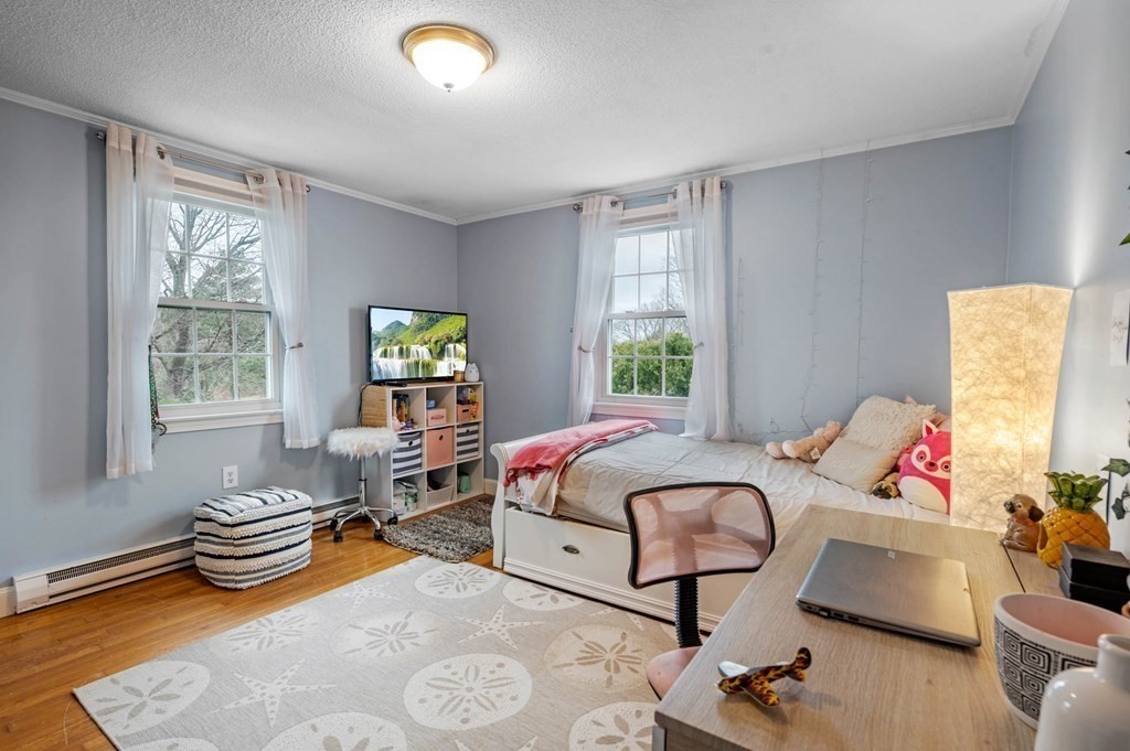 12 Pitman Road Marblehead, MA 01945 - Photo 18 of 28 a living room with furniture and a window