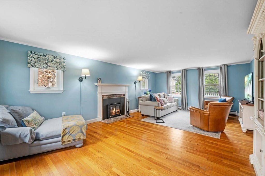 12 Pitman Road Marblehead, MA 01945 - Photo 6 of 28 a spacious bedroom with a bed and wooden floor