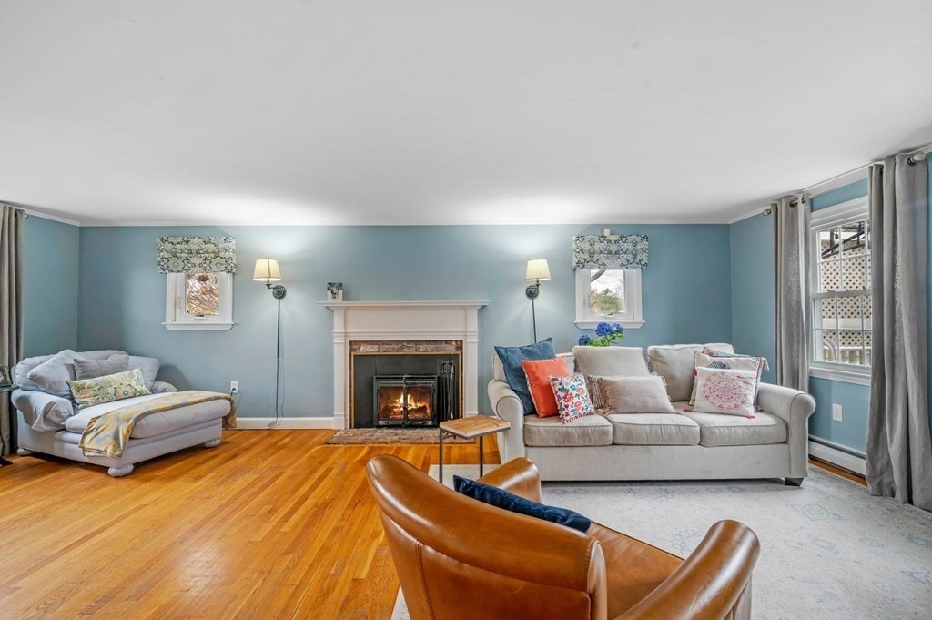12 Pitman Road Marblehead, MA 01945 - Photo 7 of 28 a living room with furniture and a fireplace