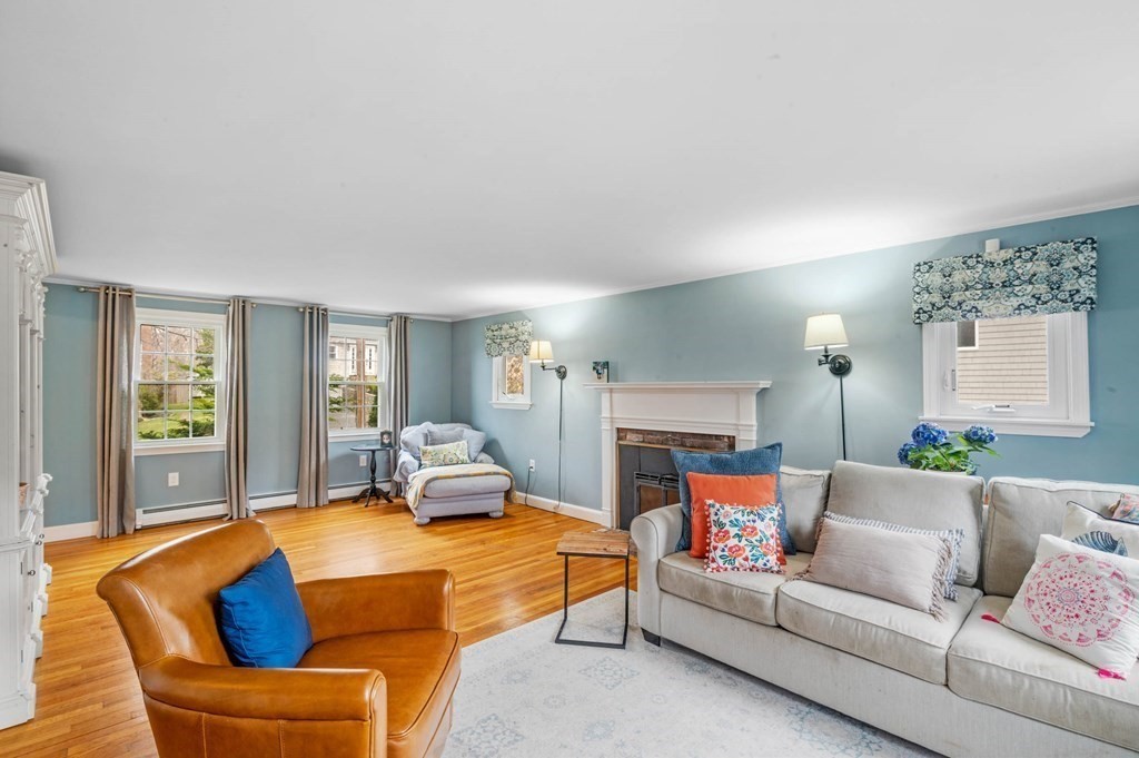12 Pitman Road Marblehead, MA 01945 - Photo 8 of 28 a living room with furniture fireplace and a large window