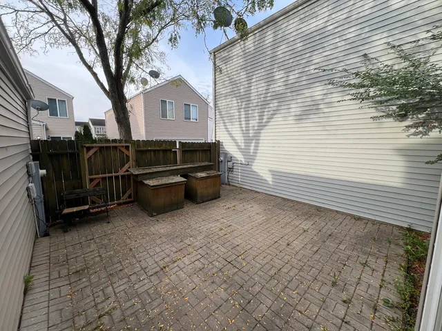 a front view of a house with parking space