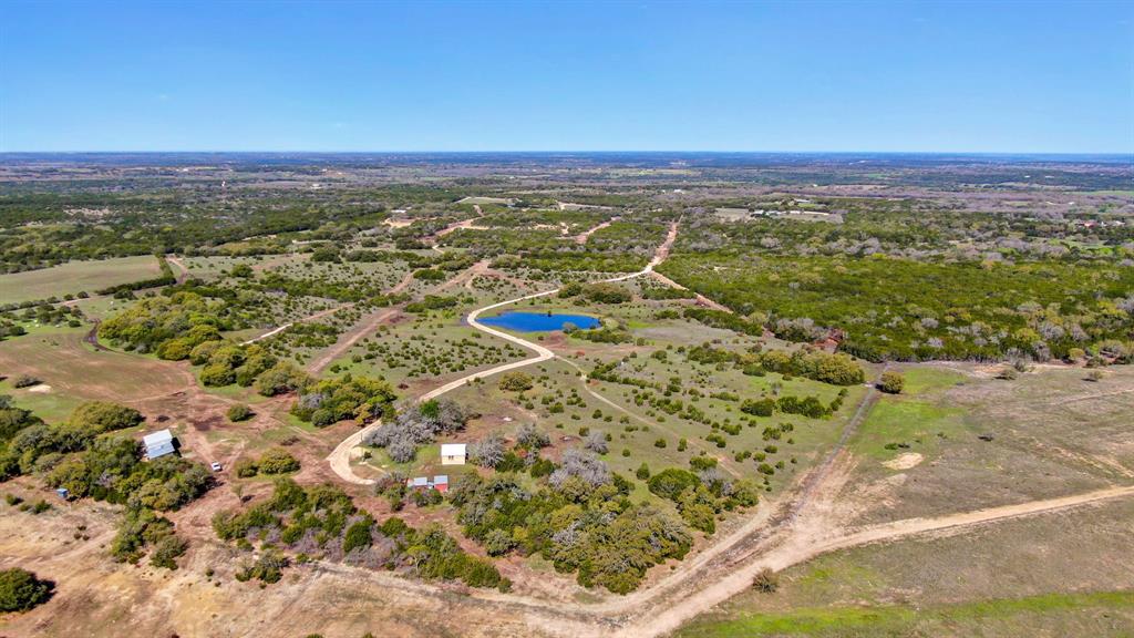 1012 Xxx County Road Bluff Dale, TX 76433 - Photo 16 of 19 a view of a city with an ocean beach