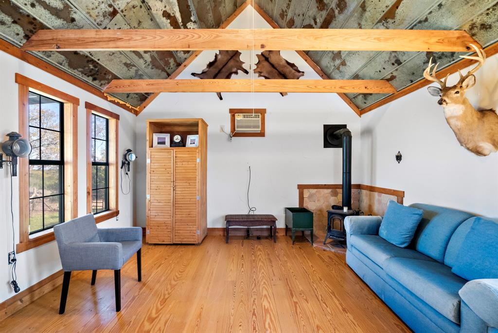 1012 Xxx County Road Bluff Dale, TX 76433 - Photo 10 of 19 a outdoor space with patio the couches and a dining table with chairs