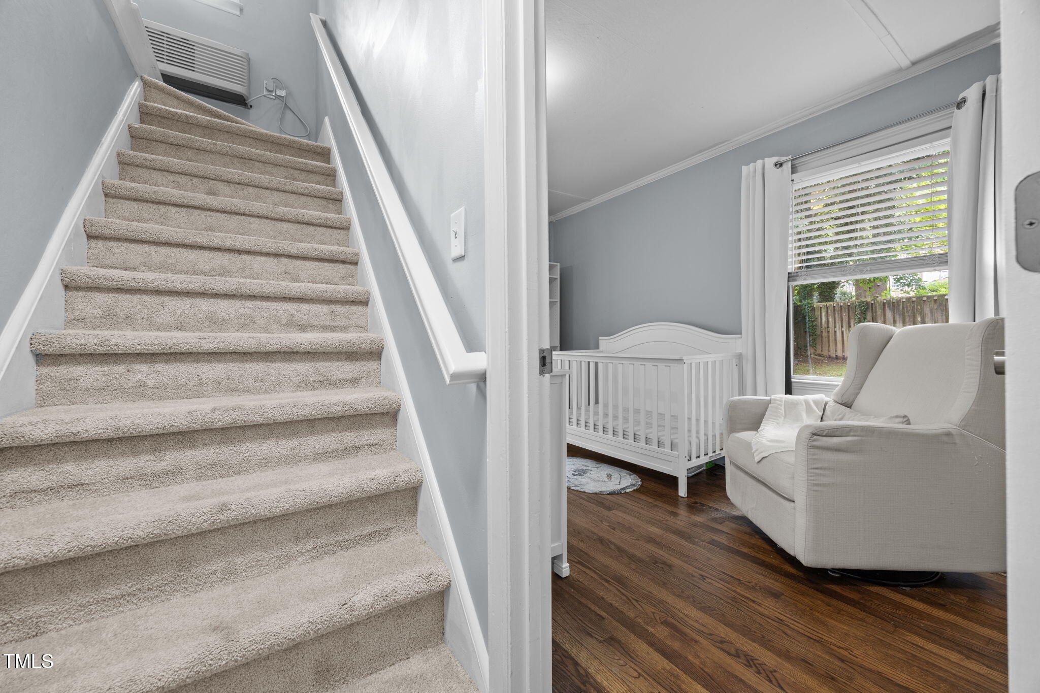 2721 Cartier Drive Raleigh, NC 27608 - Photo 26 of 44 a view of entryway and hall with wooden floor