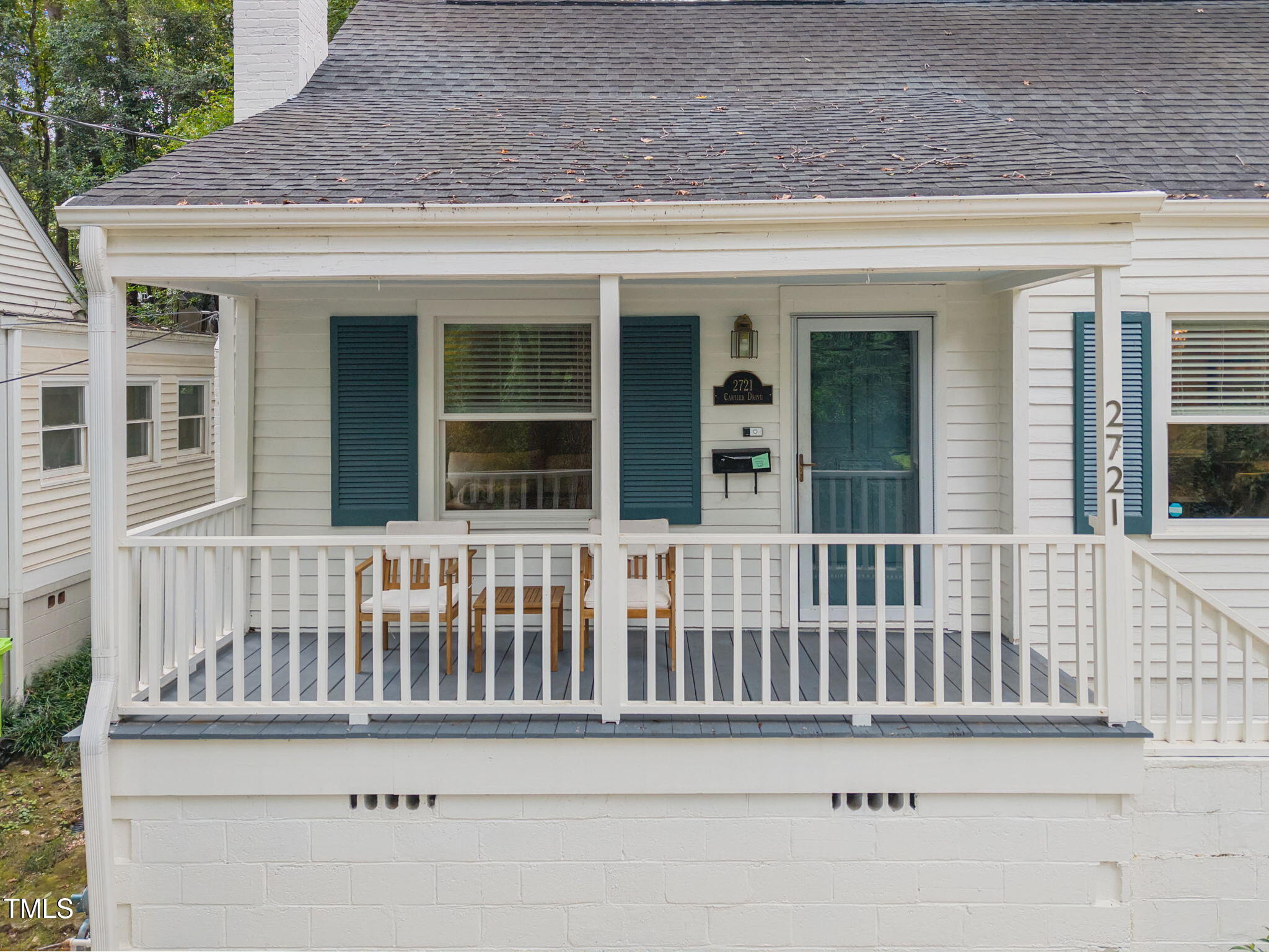 2721 Cartier Drive Raleigh, NC 27608 - Photo 4 of 44 a view of a house with wooden fence