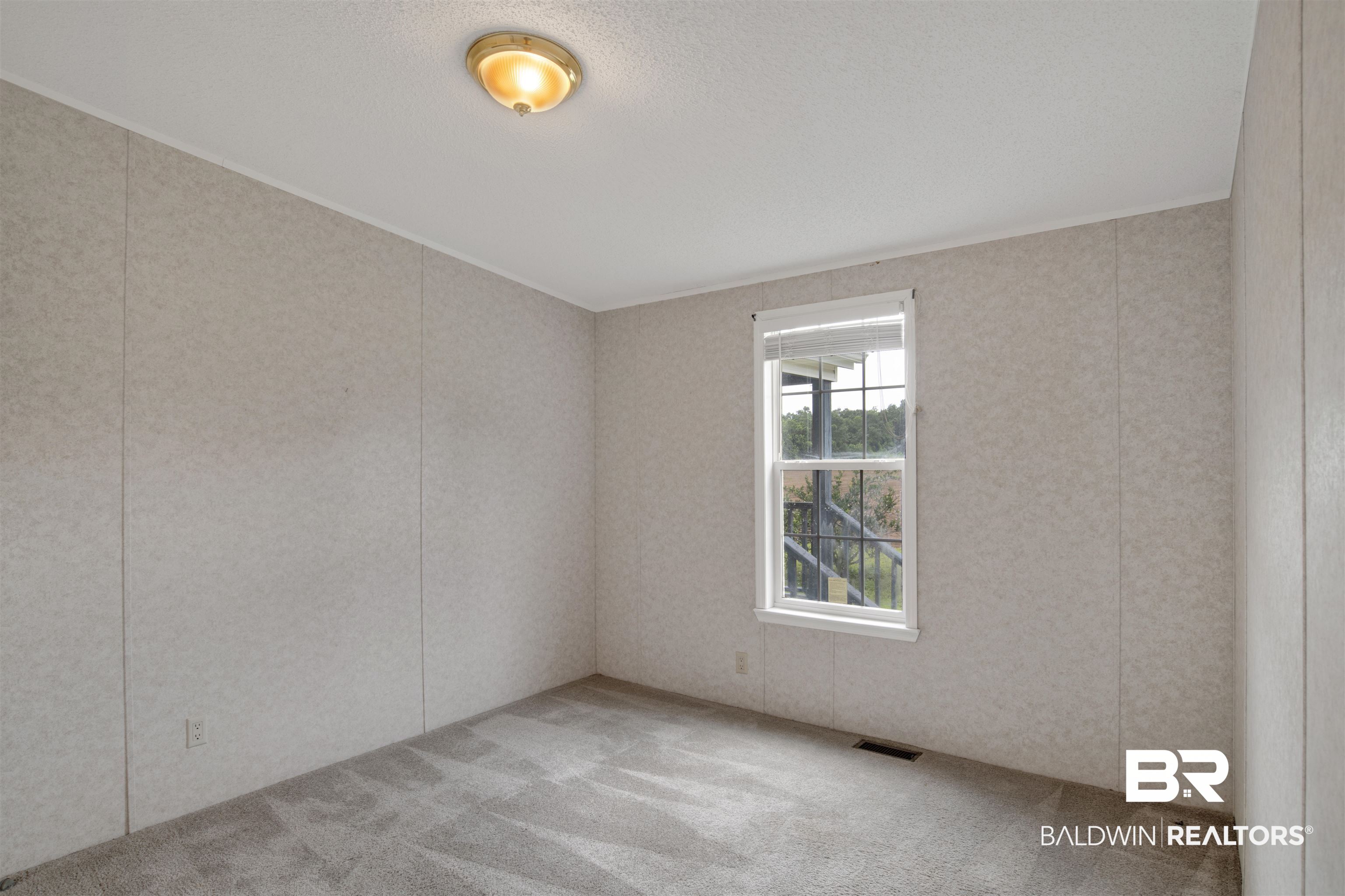 25700 County Road 71 Robertsdale, AL 36567 - Photo 18 of 40 Empty room with carpet floors