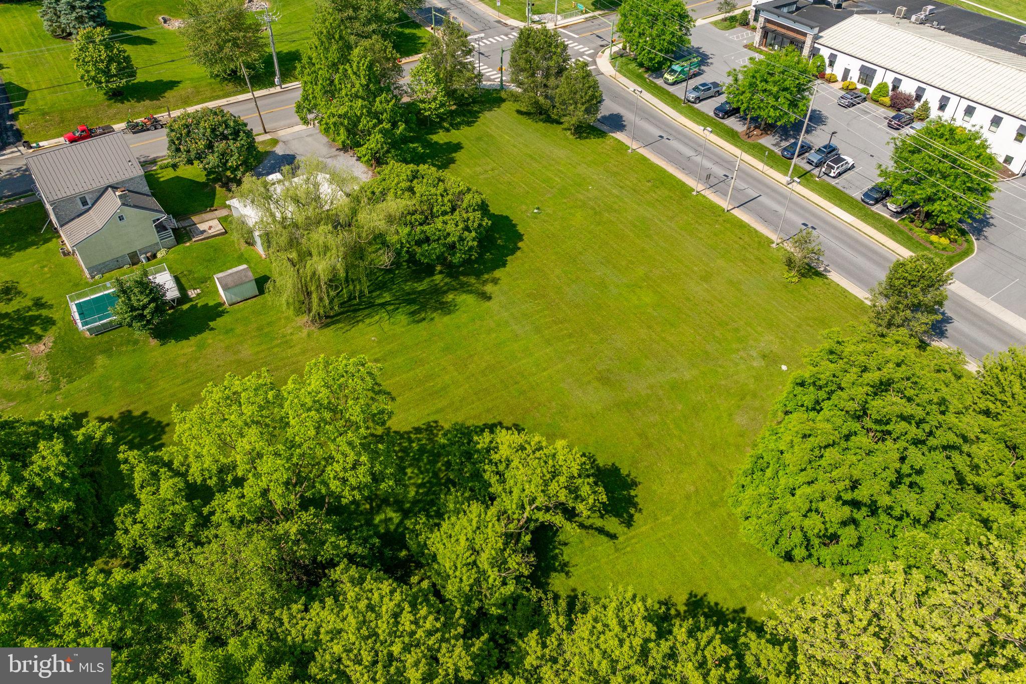 601 East Main Street Lititz, PA 17543 - Photo 9 of 18 an aerial view of a residential houses with yard and swimming pool