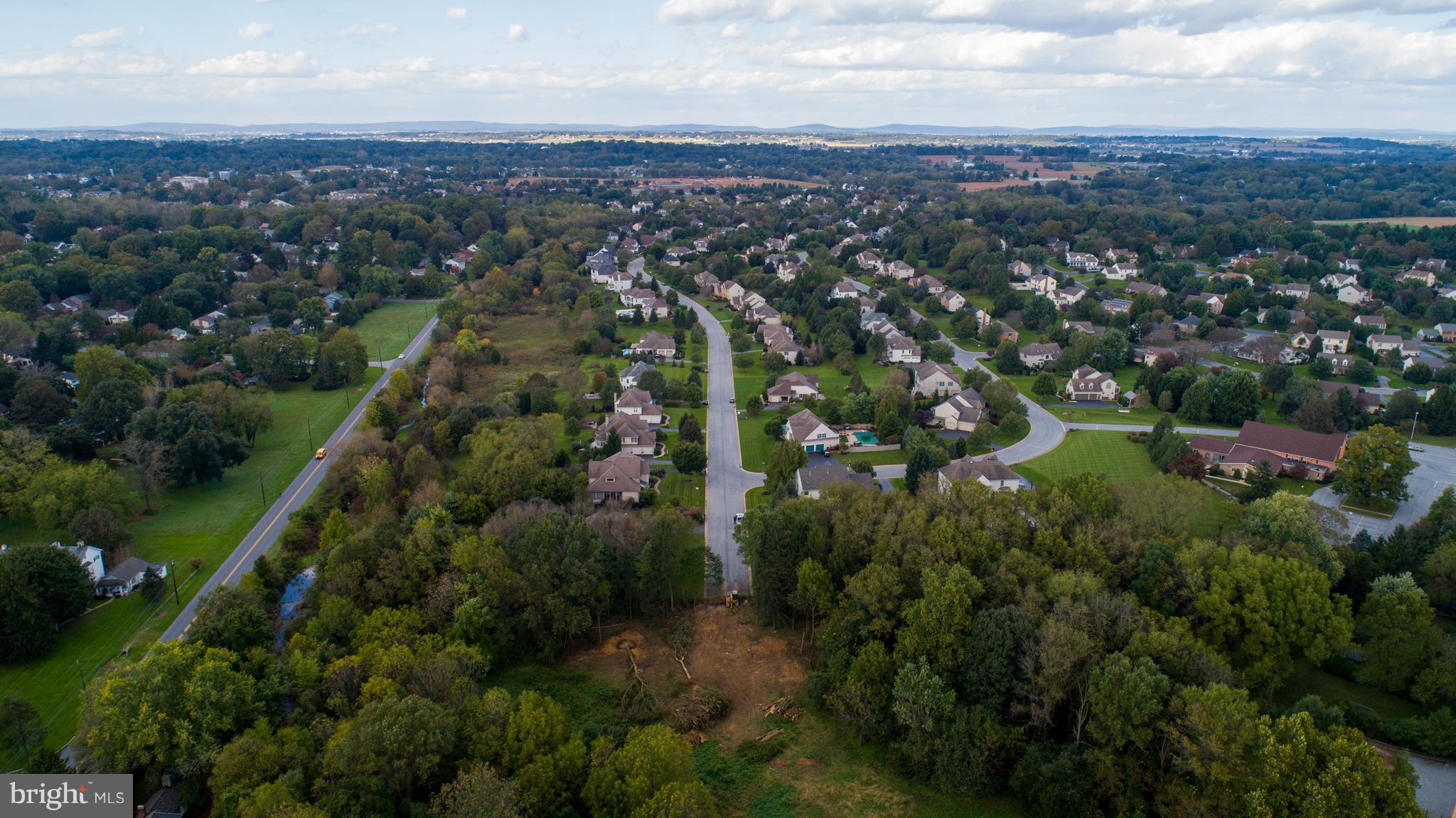 1922 Pickering Trail Lancaster, PA 17601 - Photo 10 of 15 an aerial view of residential houses with outdoor space and trees