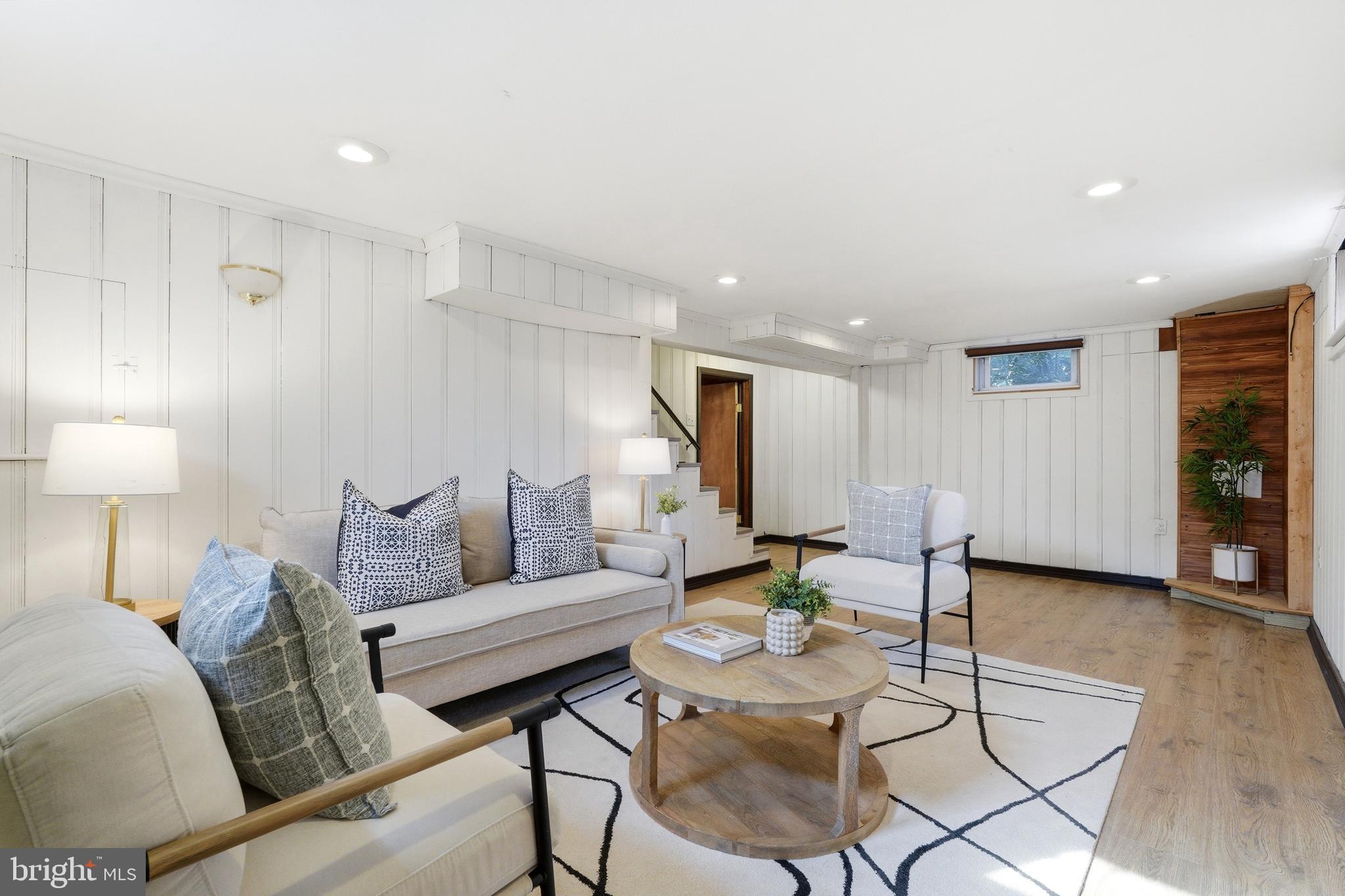 10015 Reddick Drive Silver Spring, MD 20901 - Photo 35 of 41 a living room with furniture and a wooden floor