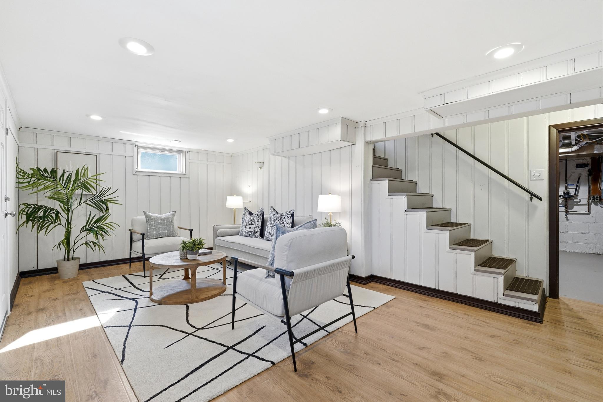 10015 Reddick Drive Silver Spring, MD 20901 - Photo 36 of 41 a living room with furniture and wooden floor