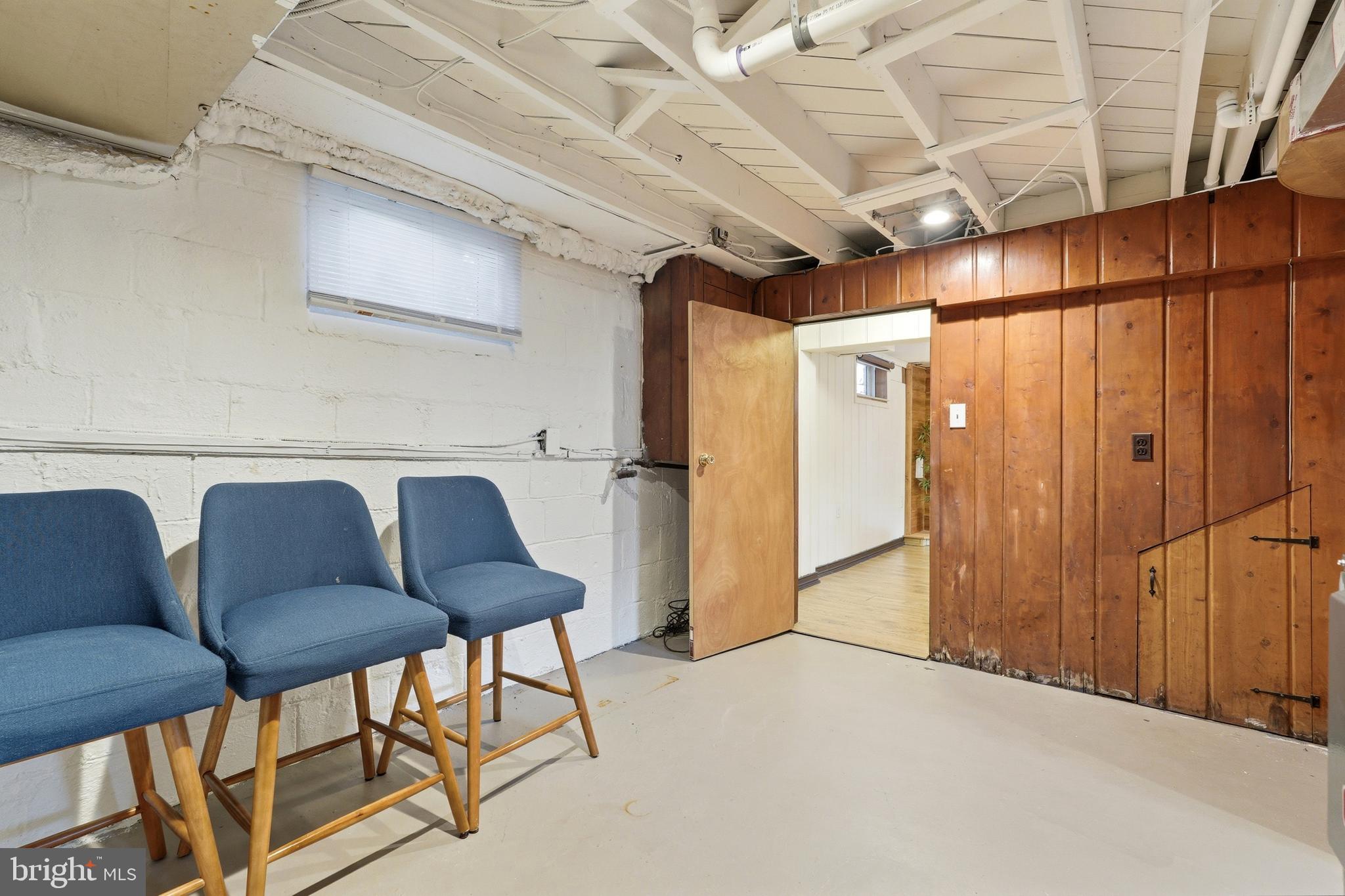 10015 Reddick Drive Silver Spring, MD 20901 - Photo 38 of 41 a living room with a couch and a table