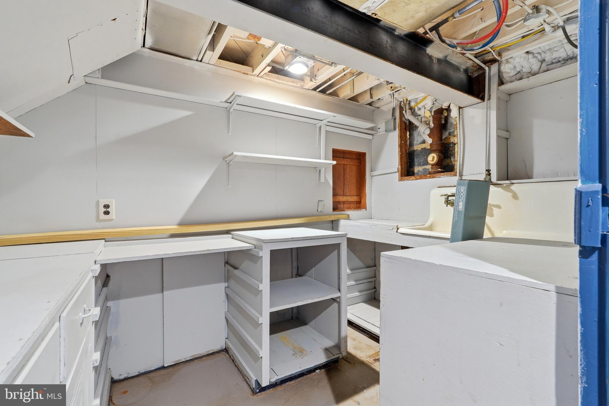 10015 Reddick Drive Silver Spring, MD 20901 - Photo 41 of 41 a utility room with cabinets and washer