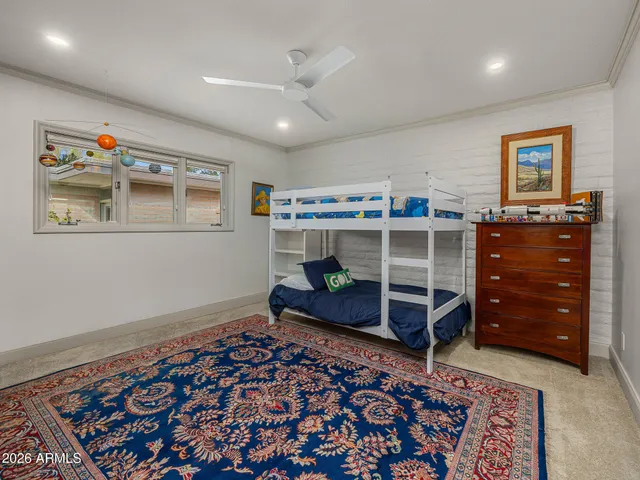 a bathroom with a granite countertop sink a mirror a shower and a bathtub
