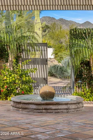 a view of water heater room with glass door
