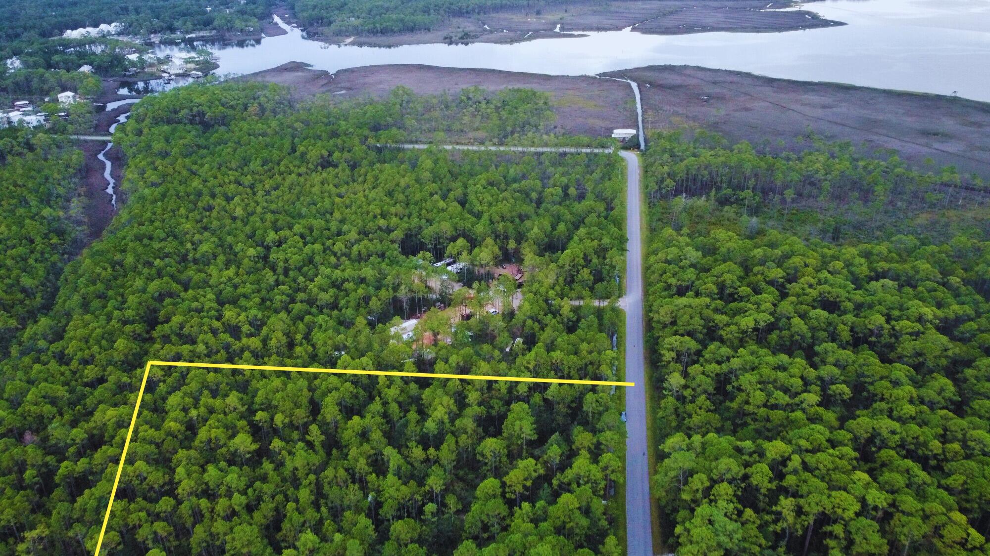 Lot P North Church Street Santa Rosa Beach, FL 32459 - Photo 1 of 6 a view of a forest from a balcony