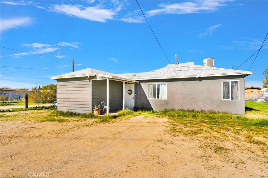 25466 Jasper Road Barstow, CA 92311 - Photo 1 of 22 a view of a house with a yard