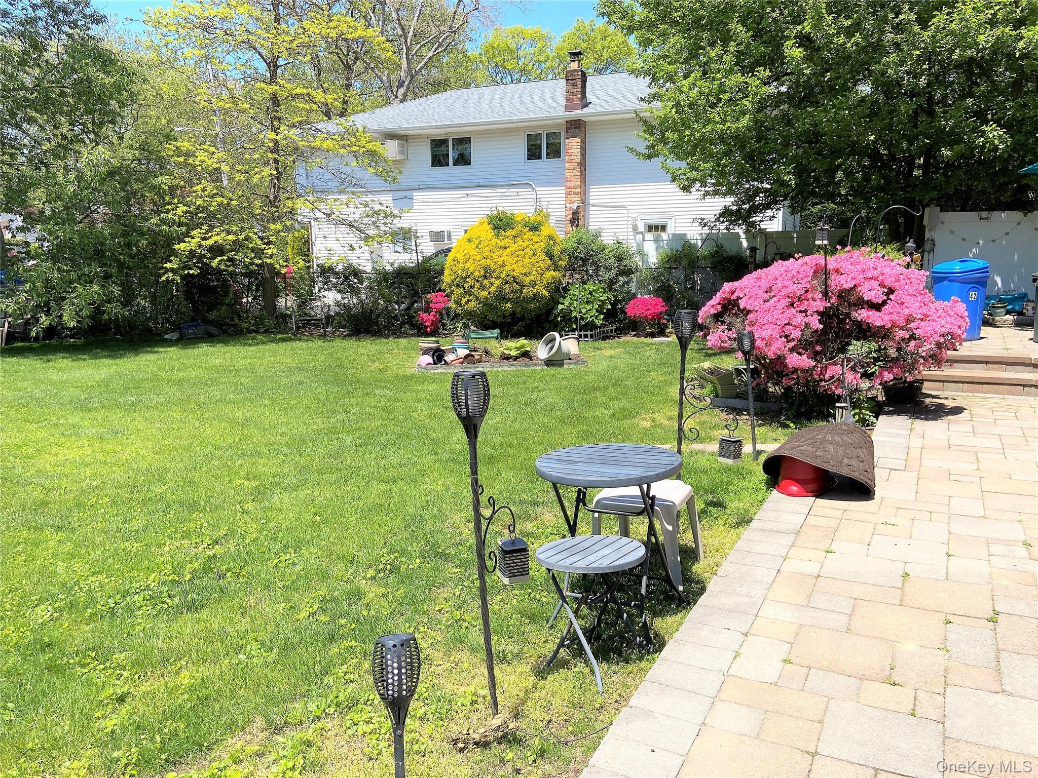 42 Hamilton Road, Unit LEFT North Merrick, NY 11566 - Photo 4 of 24 Exclusive Entertaining Backyard