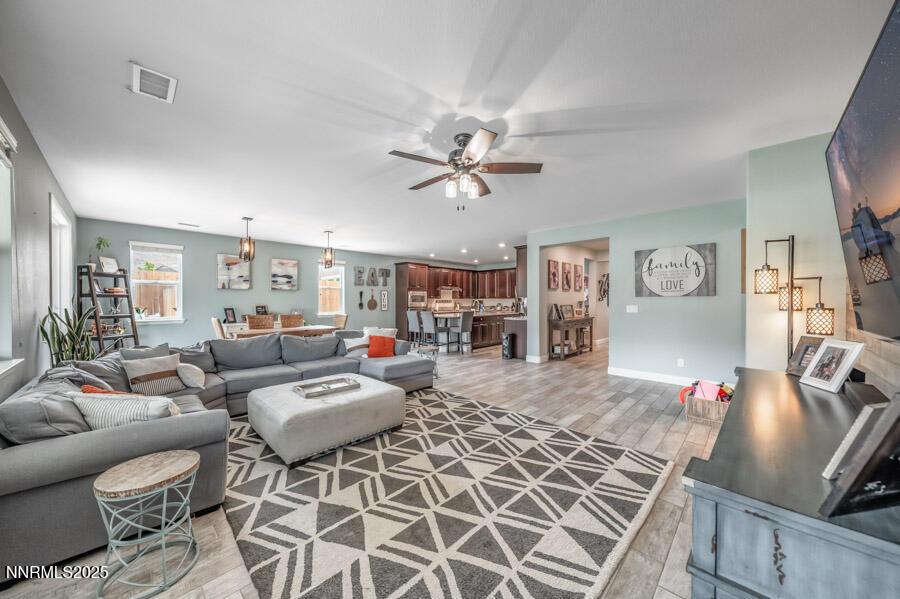 2745 Trail Rider Drive Reno, NV 89521 - Photo 20 of 50 a living room with furniture and wooden floor