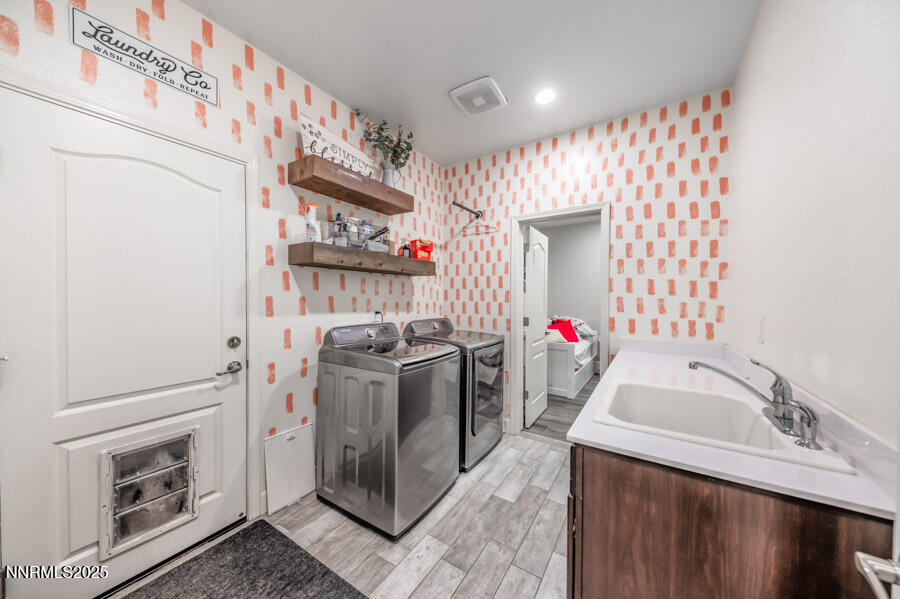 2745 Trail Rider Drive Reno, NV 89521 - Photo 33 of 50 a bathroom with a sink and a mirror