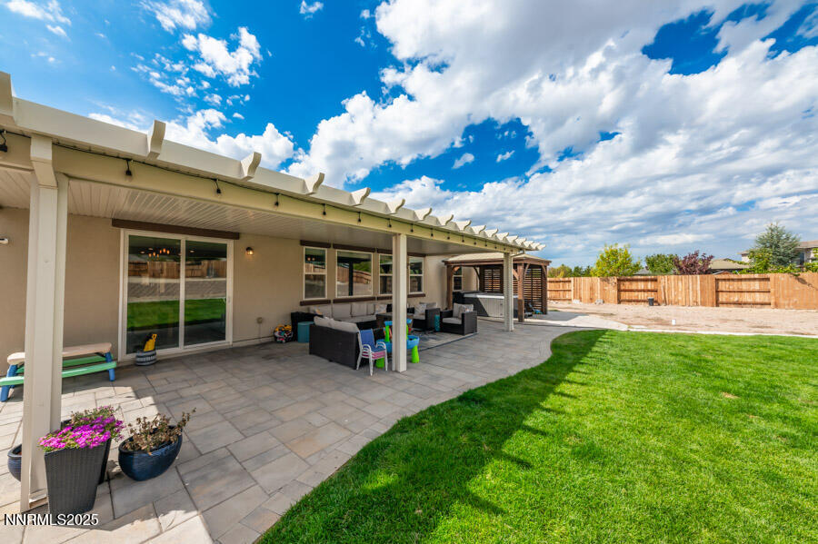2745 Trail Rider Drive Reno, NV 89521 - Photo 38 of 50 a view of a house with sitting area and garden