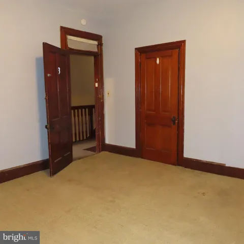 a view of a livingroom with a staircase