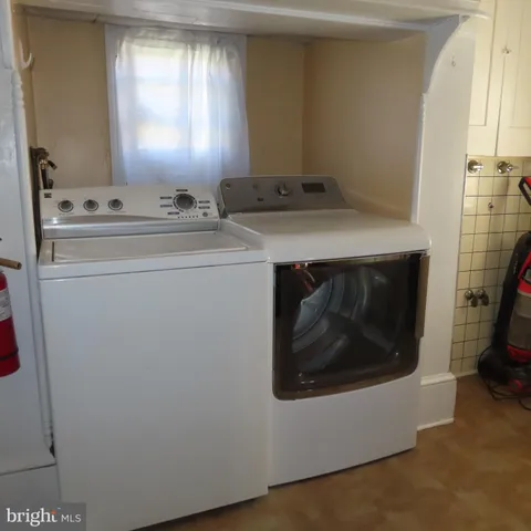 a view of a balcony with wooden floor