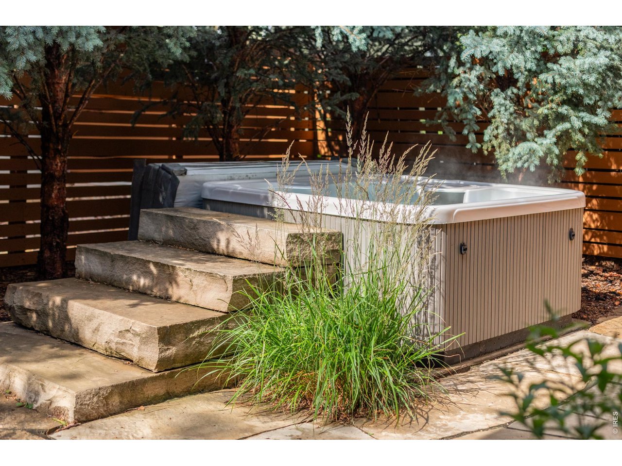 3963 Springleaf Lane Boulder, CO 80304 - Photo 27 of 32 Spa with stone steps.
