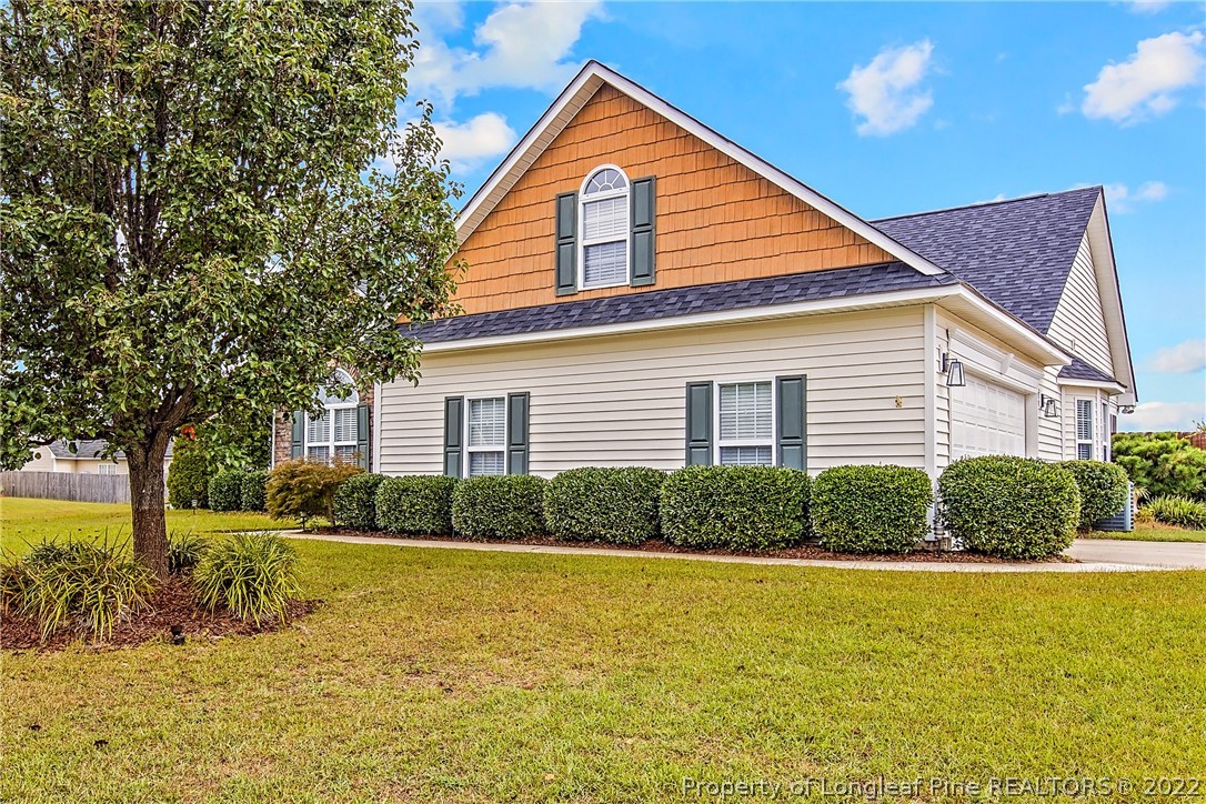 1909 Yellowbrick Road Fayetteville, NC 28314 - Photo 2 of 25 a view of a house with a yard