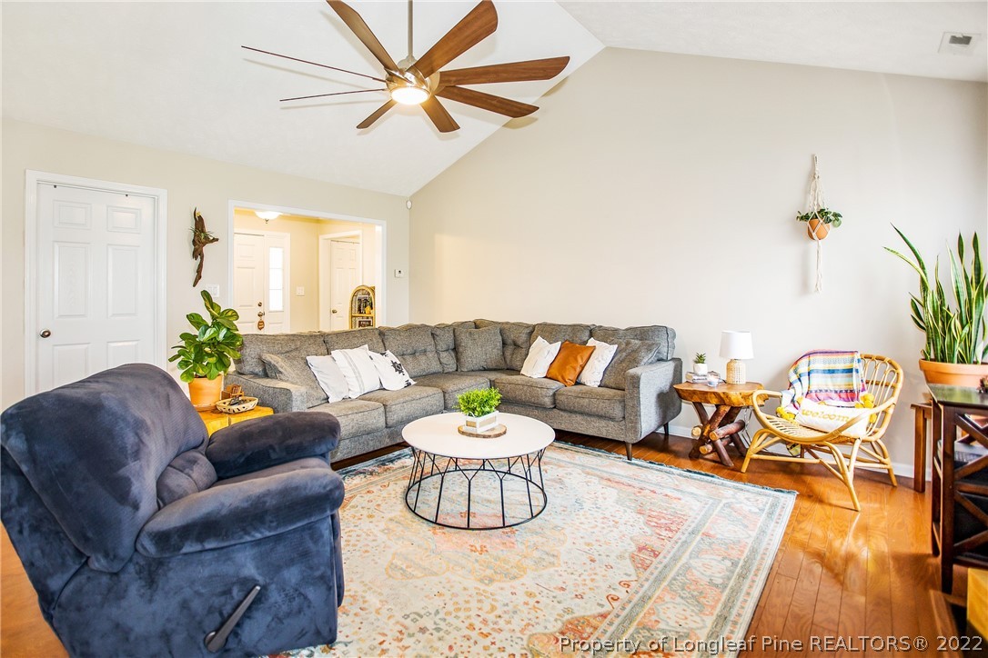 1909 Yellowbrick Road Fayetteville, NC 28314 - Photo 7 of 25 a living room with furniture and a rug