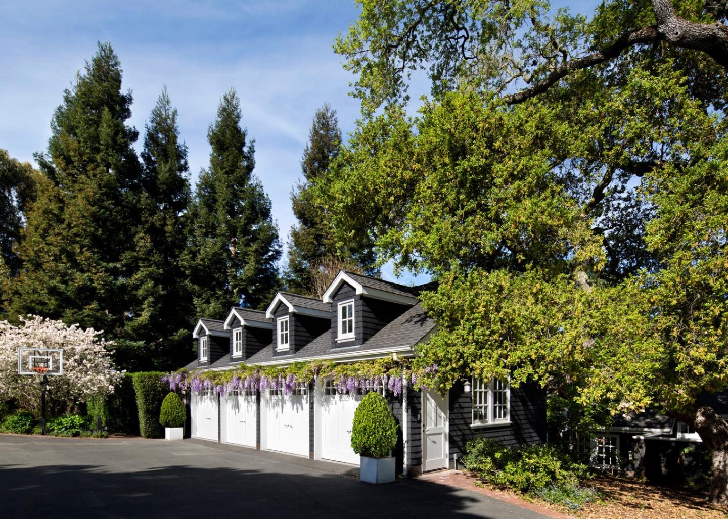 137 Moore Road Woodside, CA 94062 - Photo 21 of 22 a front view of a building with trees