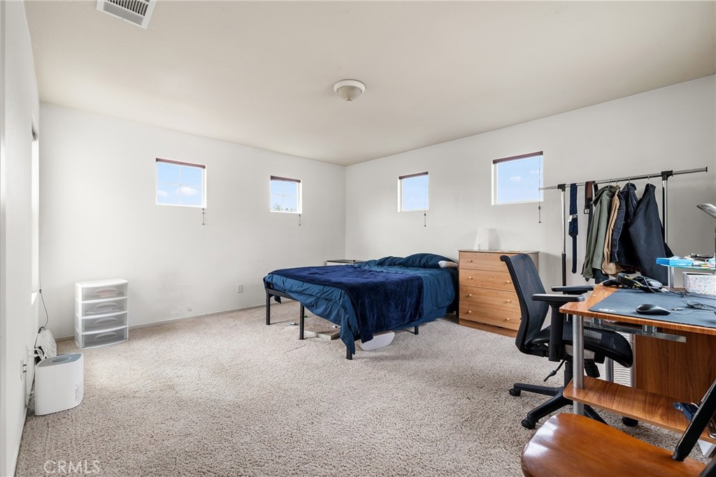 4357 Mathias Way Merced, CA 95348 - Photo 14 of 32 a view of a workspace with furniture and gym equipment