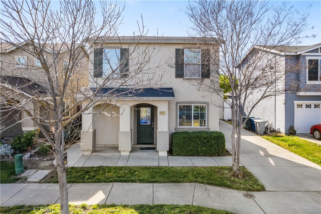 4357 Mathias Way Merced, CA 95348 - Photo 2 of 32 a front view of a house with garden