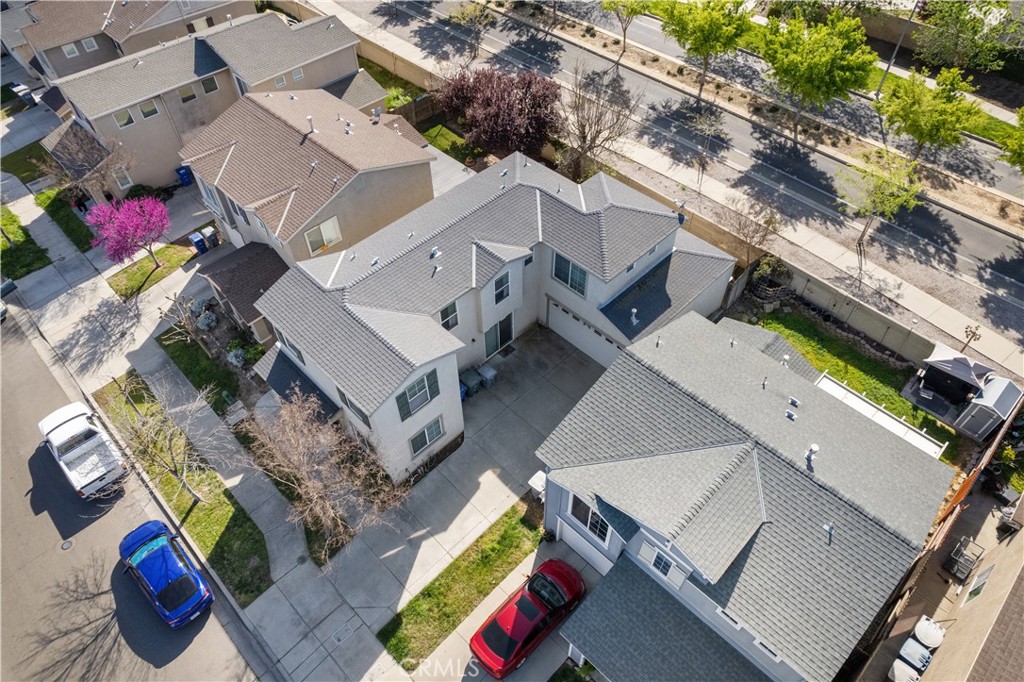 4357 Mathias Way Merced, CA 95348 - Photo 28 of 32 an aerial view of a house with a yard