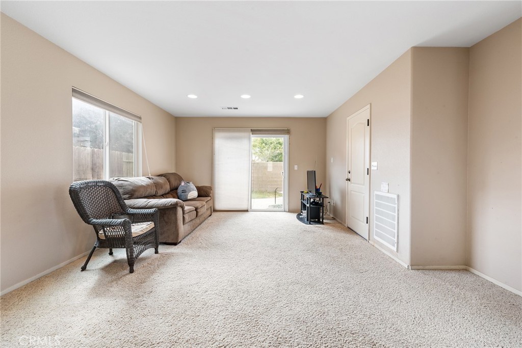 4357 Mathias Way Merced, CA 95348 - Photo 5 of 32 a living room with furniture and a window