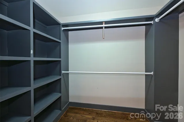a view of an empty walk in closet