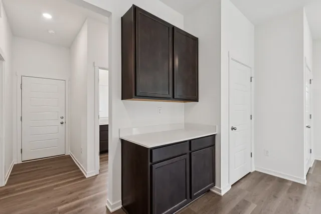 a view of a room with racks on the wall