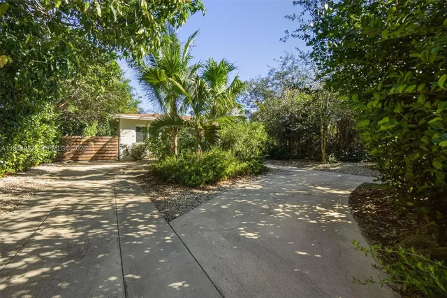 a view of backyard with green space