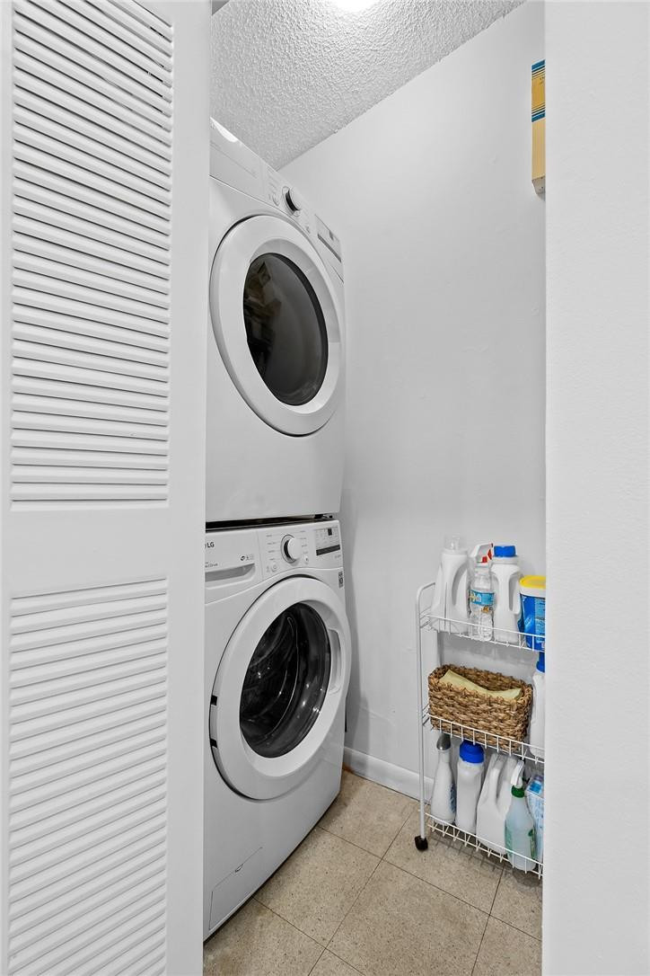 Undisclosed Address Boca Raton, FL 33428 - Photo 13 of 35 a utility room with dryer and washer