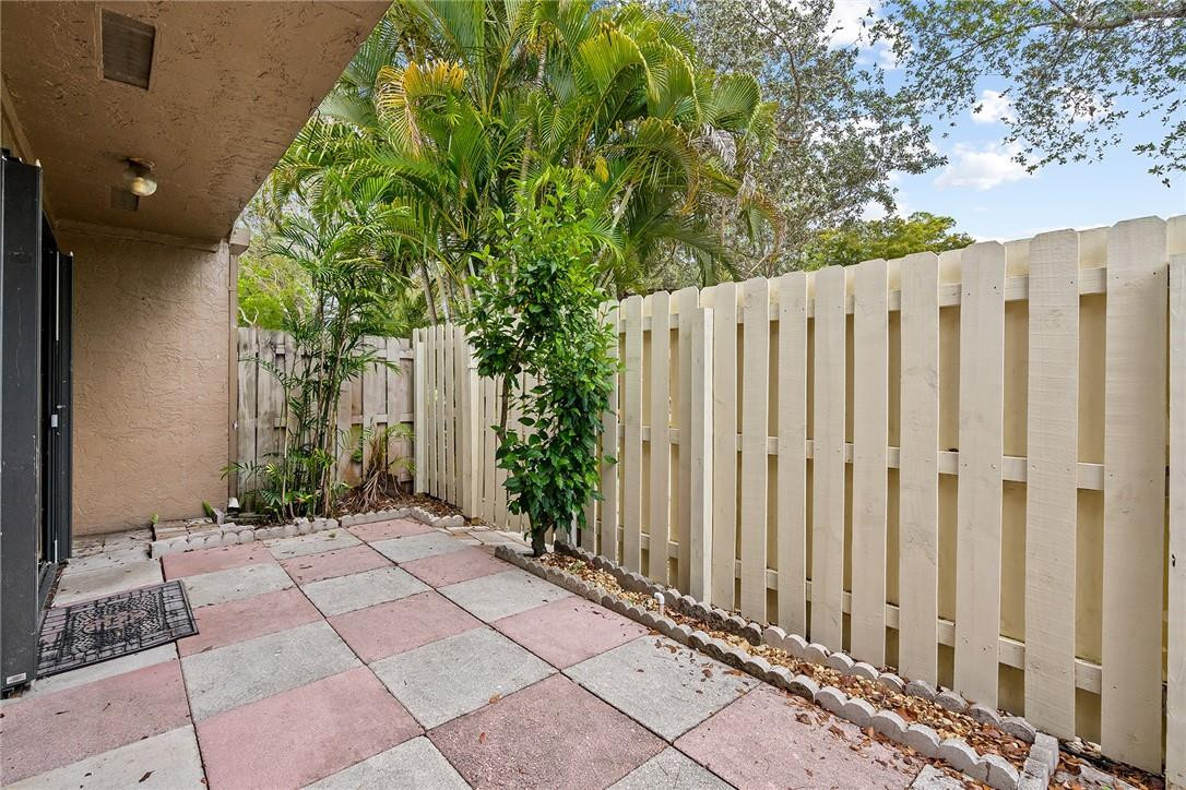 Undisclosed Address Boca Raton, FL 33428 - Photo 28 of 35 a view of a wooden door with a house