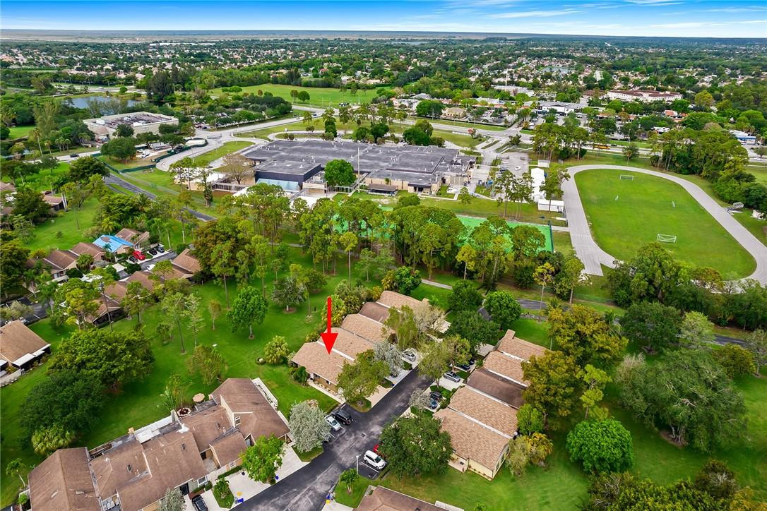Undisclosed Address Boca Raton, FL 33428 - Photo 34 of 35 an aerial view of residential houses with outdoor space