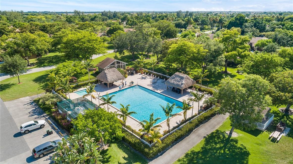 Undisclosed Address Boca Raton, FL 33428 - Photo 35 of 35 an aerial view of a residential houses with outdoor space and trees